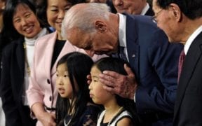 Joe Biden sniffing little girl